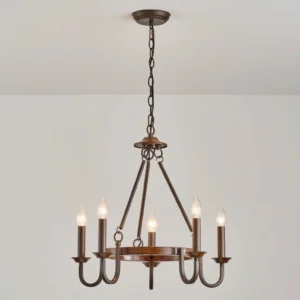 Rustic wagon wheel chandelier with vintage candle bulbs front eye-level studio view
