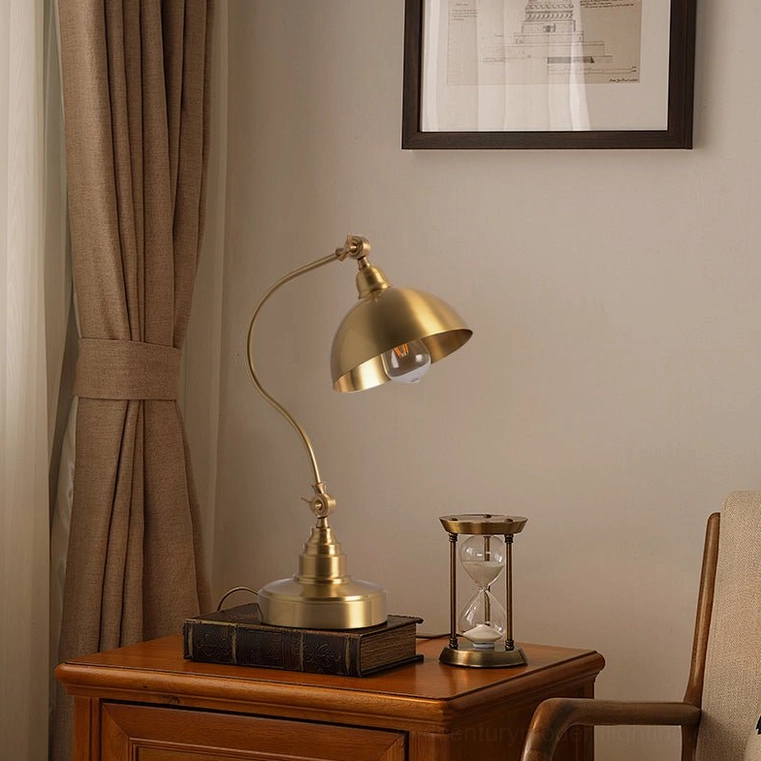 Wallace brass table lamp on residential side table with hourglass decor, cozy home setting
