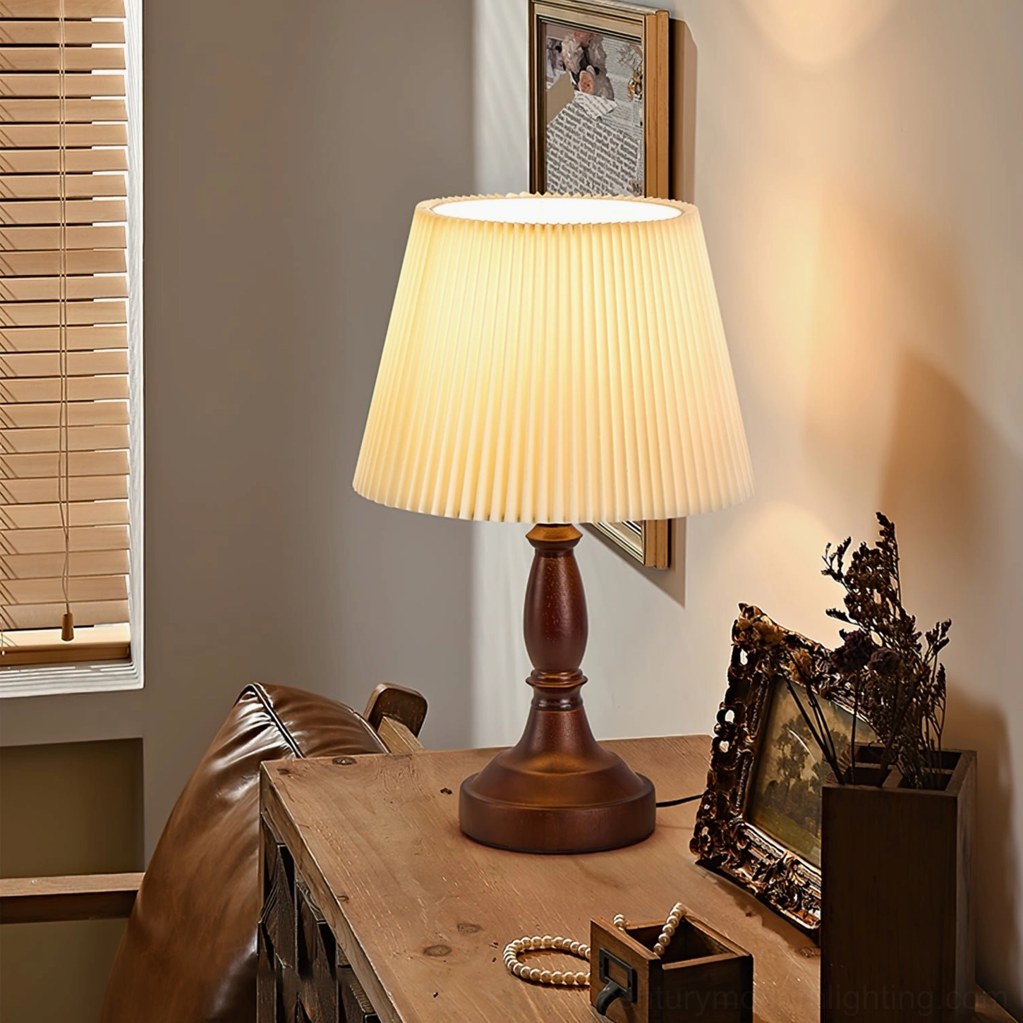 Catelyn table lamp styled on vintage desk with framed artwork and leather sofa creating retro home study atmosphere