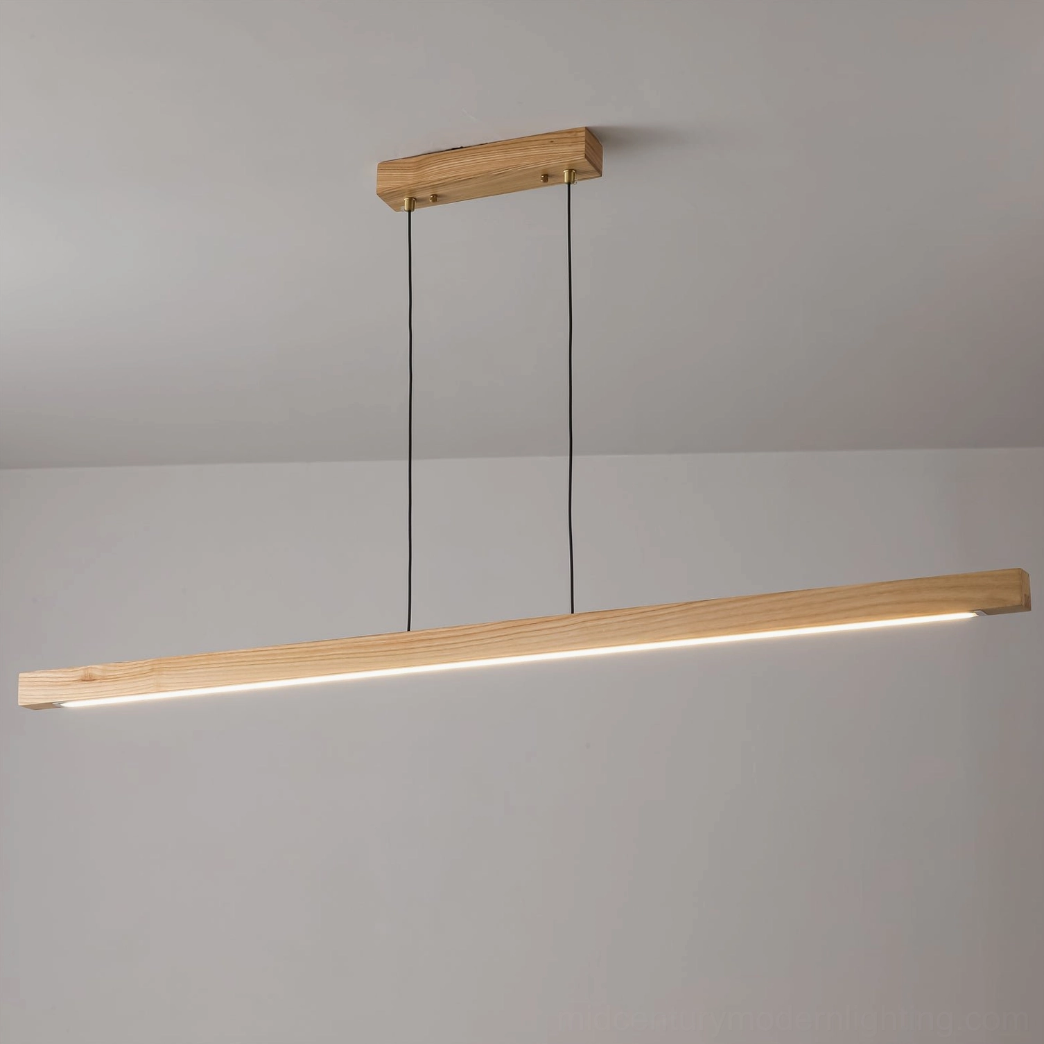 Illuminated linear wooden LED pendant light with warm glow, slim profile design on neutral gray background