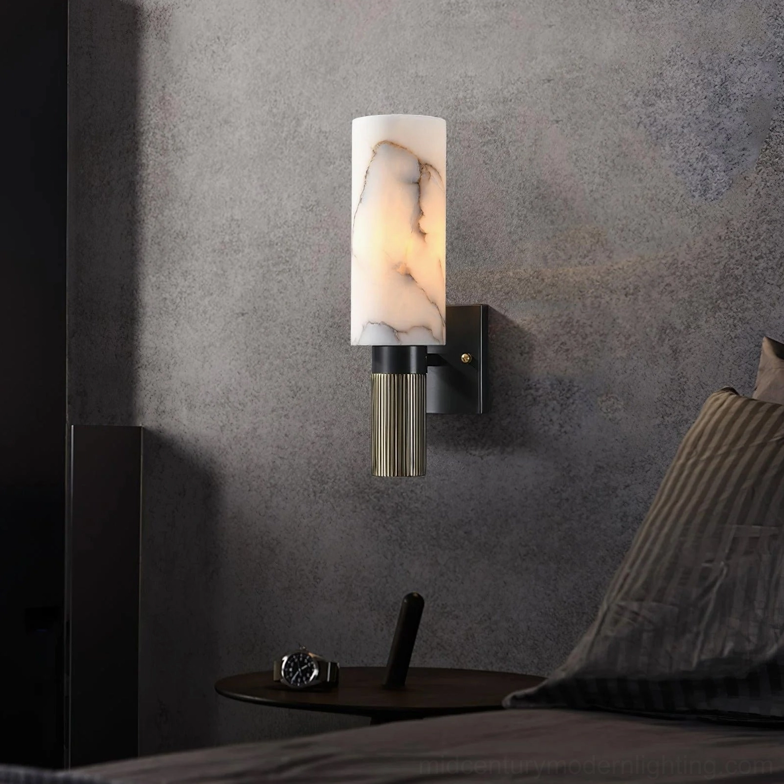 Warm-lit alabaster marble wall lamp creating soft ambient illumination in evening residential setting