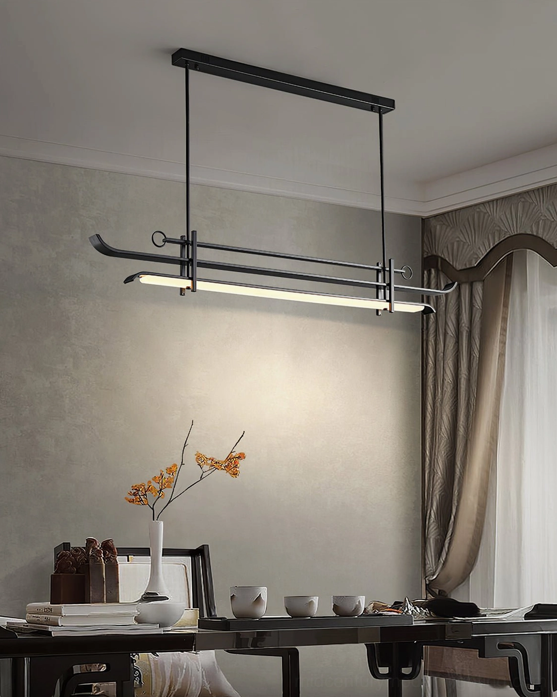 Contemporary geometric light fixture in warm ambient home dining area with soft lighting and window treatment