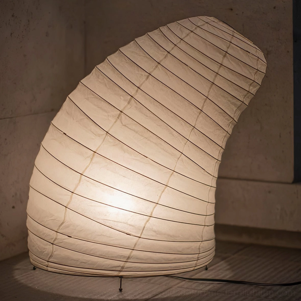 Close-up detail of washi paper lamp showing fine dark ribbed texture on natural paper shade, emphasizing artisanal hand-bonding craftsmanship