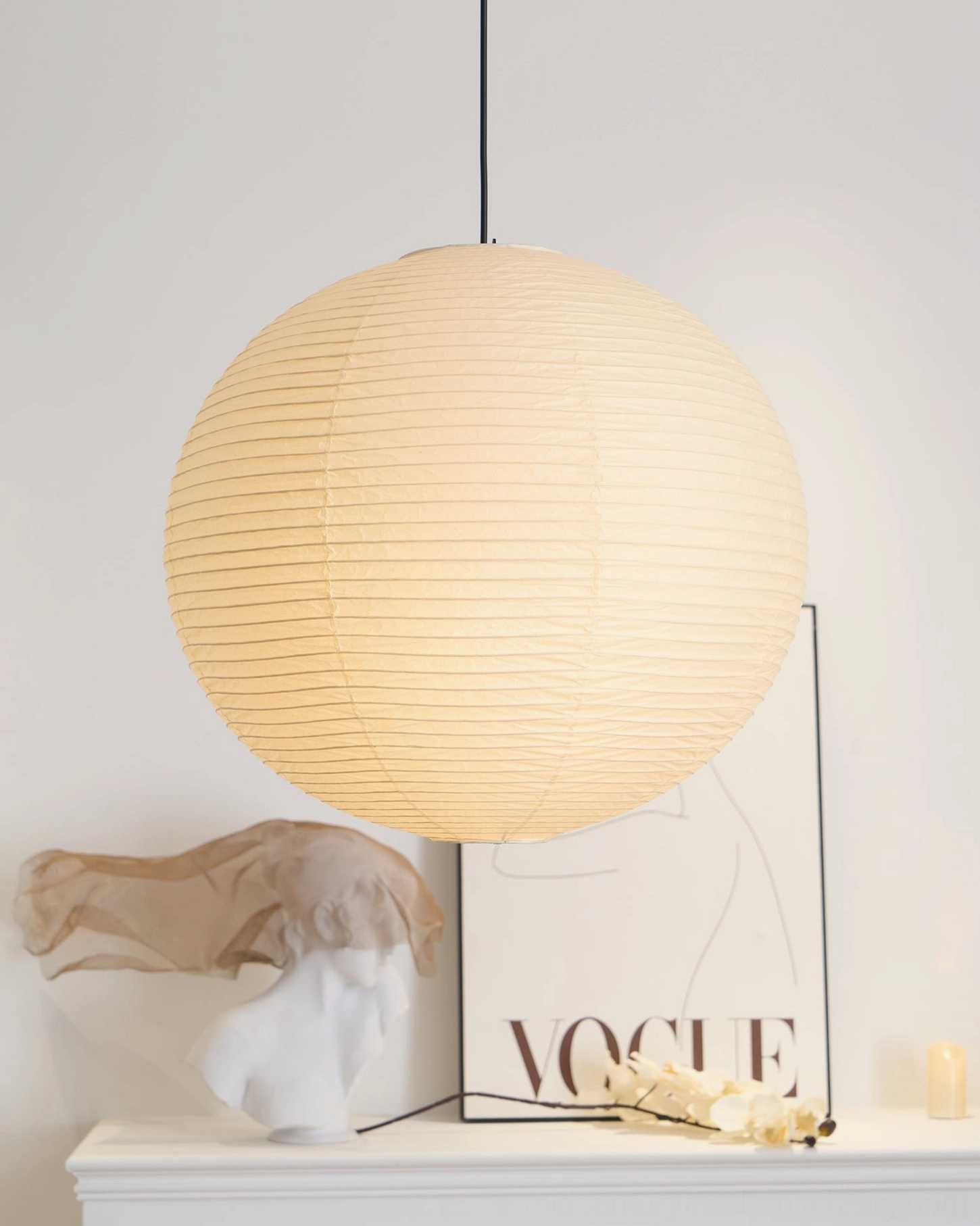 Washi paper sphere pendant light installation in contemporary residential kitchen