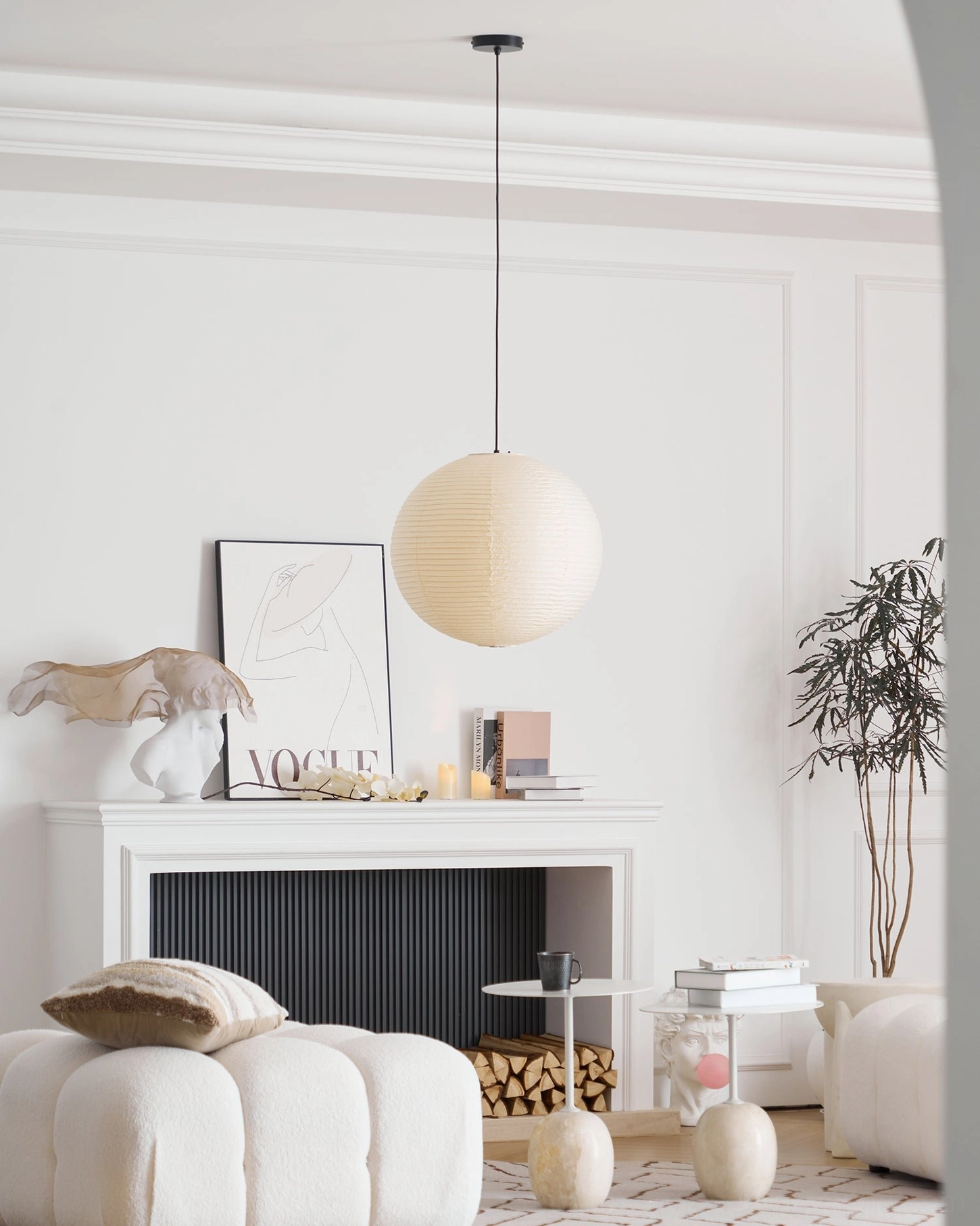 Washi paper pendant lamp showing spherical form and organic minimalist aesthetic