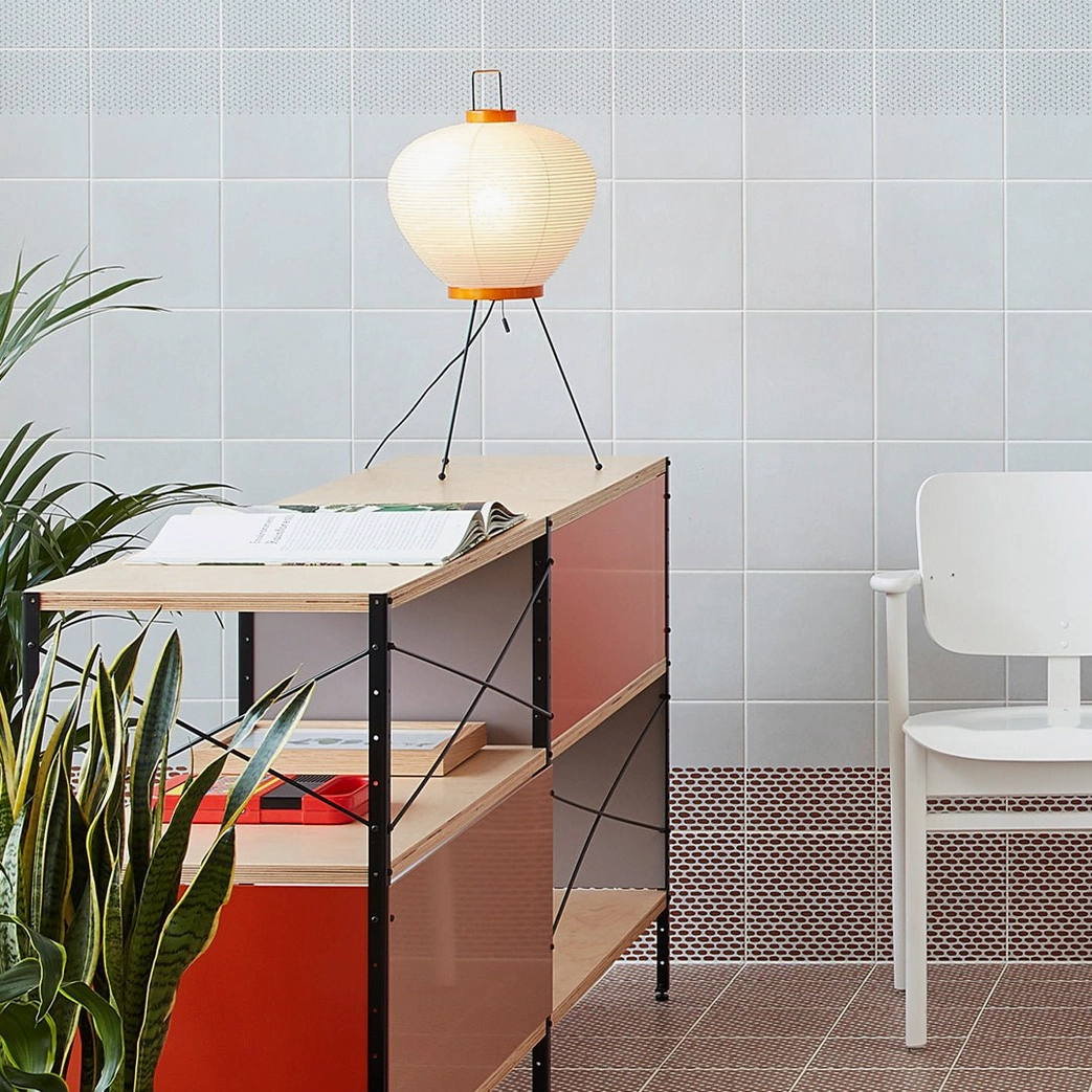 Washi Japanese table lamp in modern minimalist workspace with tile wall and colorful storage unit