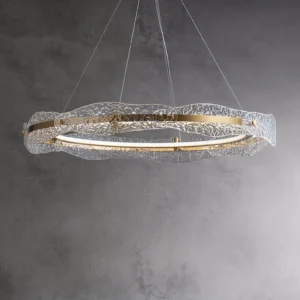Overhead view of modern water ripple pendant light showing concentric ring design and textured glass detail against concrete wall