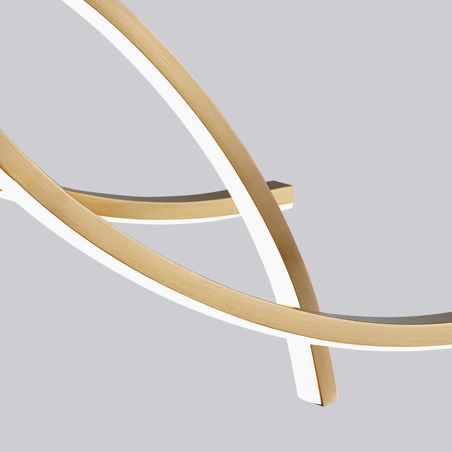 Wave Island brass pendant showing sculptural wave pattern and light distribution
