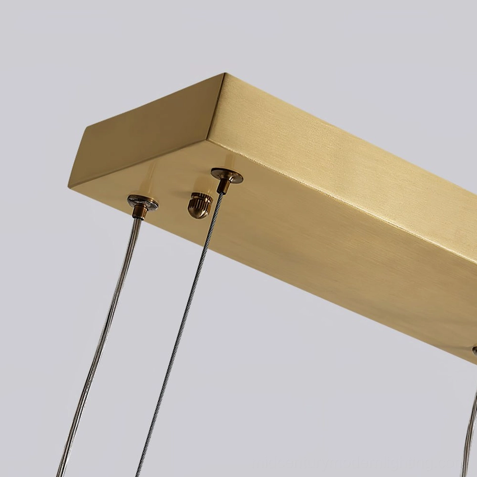 Wave Island brass pendant light fixture showing full product form and mounting configuration