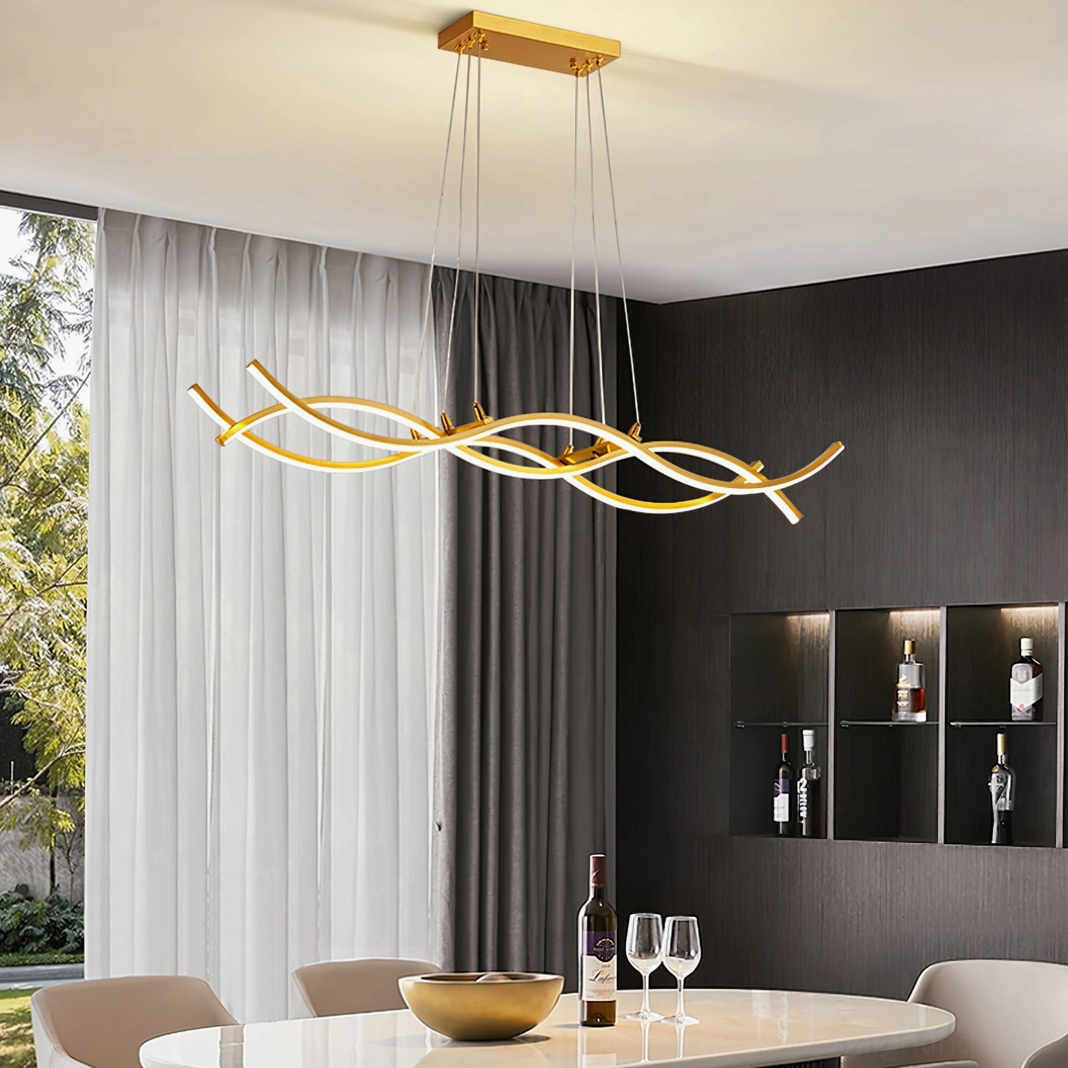 Wave pendant chandelier over round dining table with wine cabinet and sophisticated tableware styling