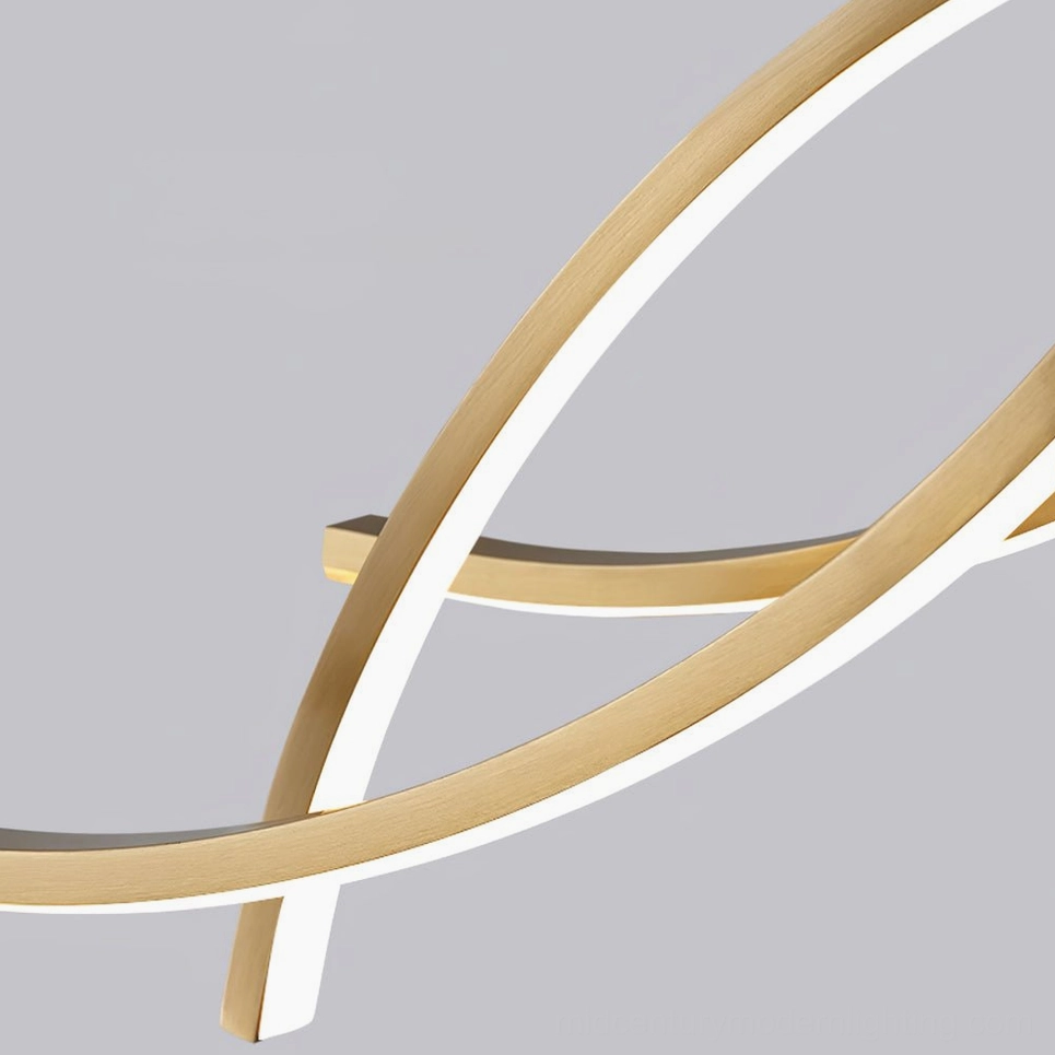 Macro close-up of wave chandelier showing curved twisted metal light bars and design details