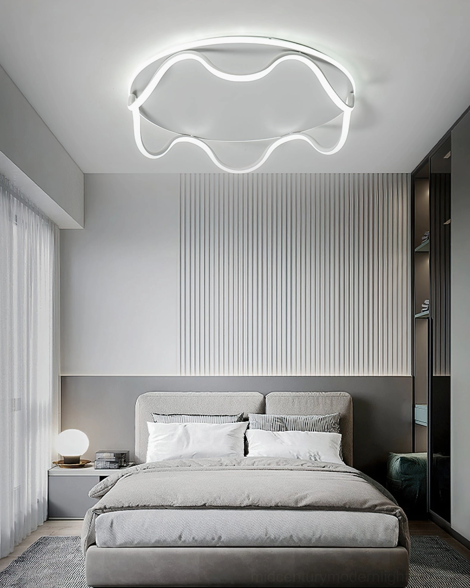 Contemporary wave LED ceiling light fixture showcasing sculptural acrylic diffuser and metal frame design