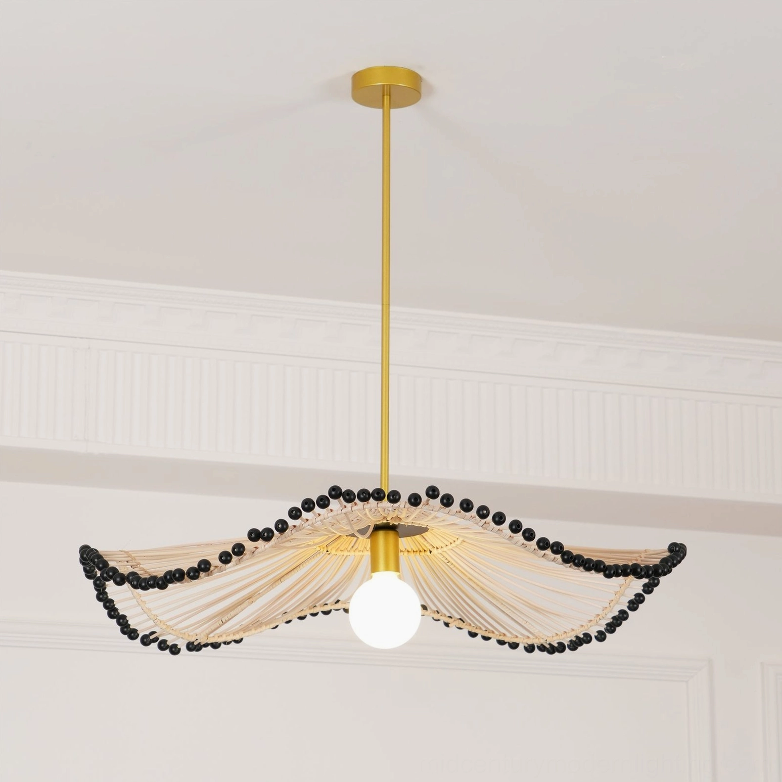 Waverly rattan pendant light product shot showing natural wavy weave structure contemporary design