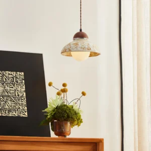 Wella pendant lamp installed in Japanese-inspired home interior with wooden sideboard and ceramic accent pieces