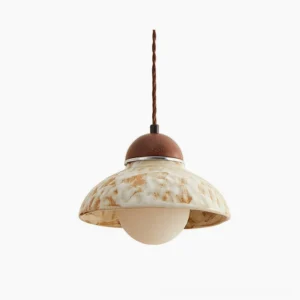 Wella ceramic pendant light with beige marbled glaze and walnut wood canopy against white background, showcasing dome design