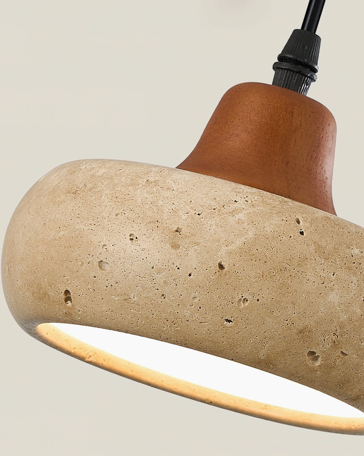 Wella pendant light with warm integrated LED casting soft ambient glow in interior space