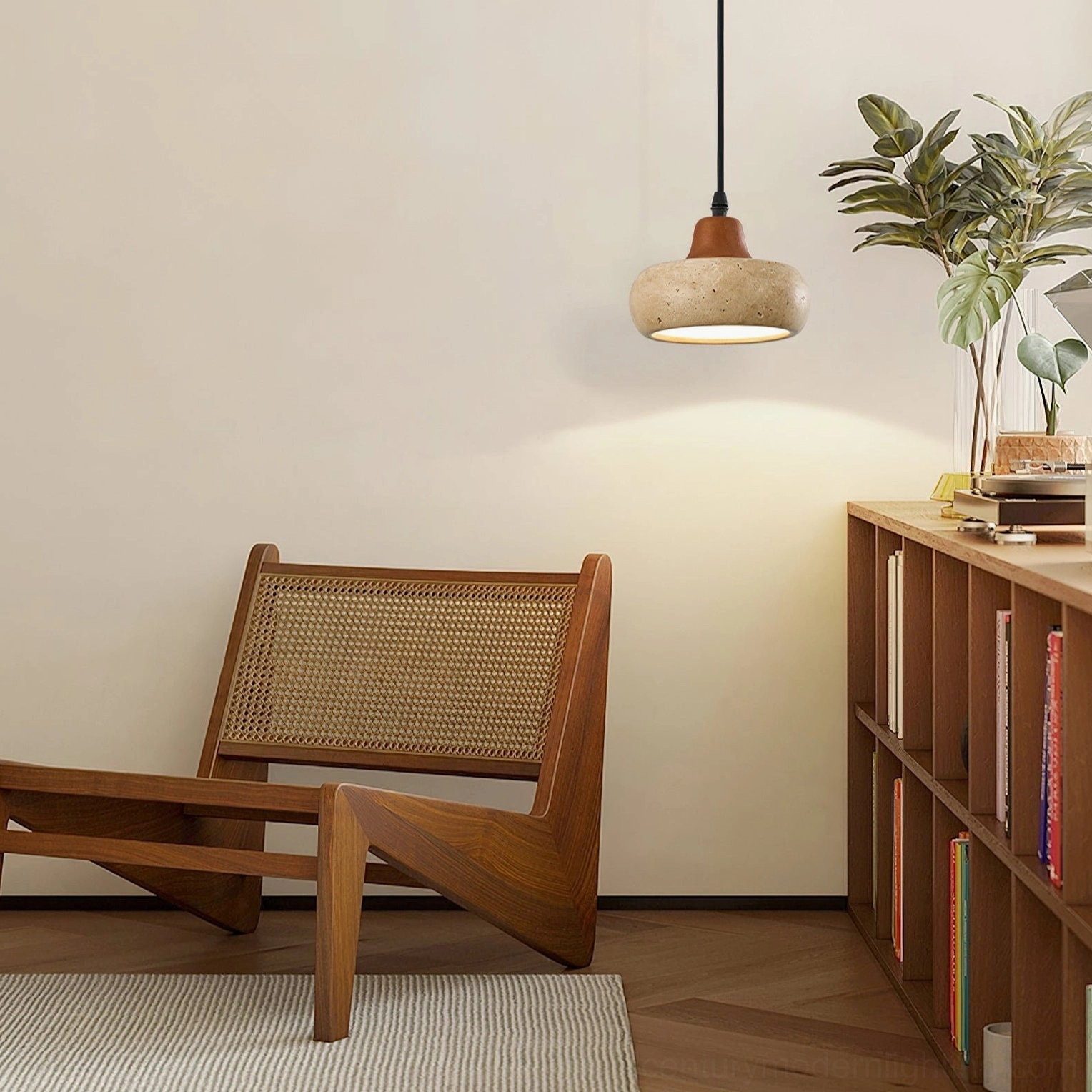 Wella pendant light installed in japandi living room corner with wooden chair and minimalist decor