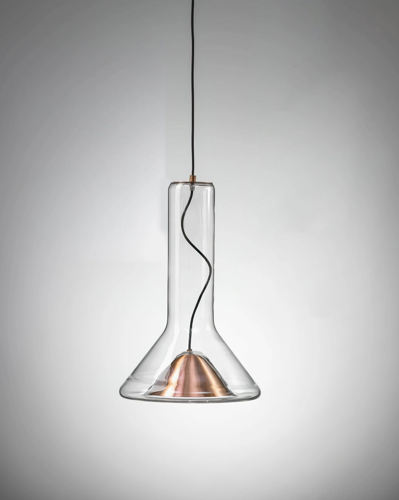 Smoke grey whistle pendant lamp in residential setting showing ambient warm light quality
