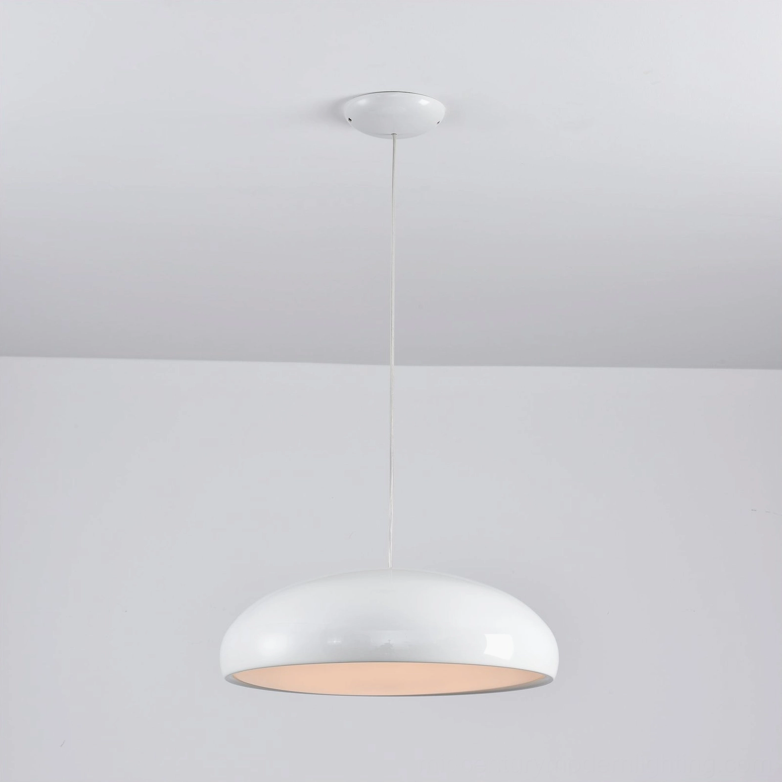 White dome pendant light with warm beige inner shade mid-century modern accent lighting