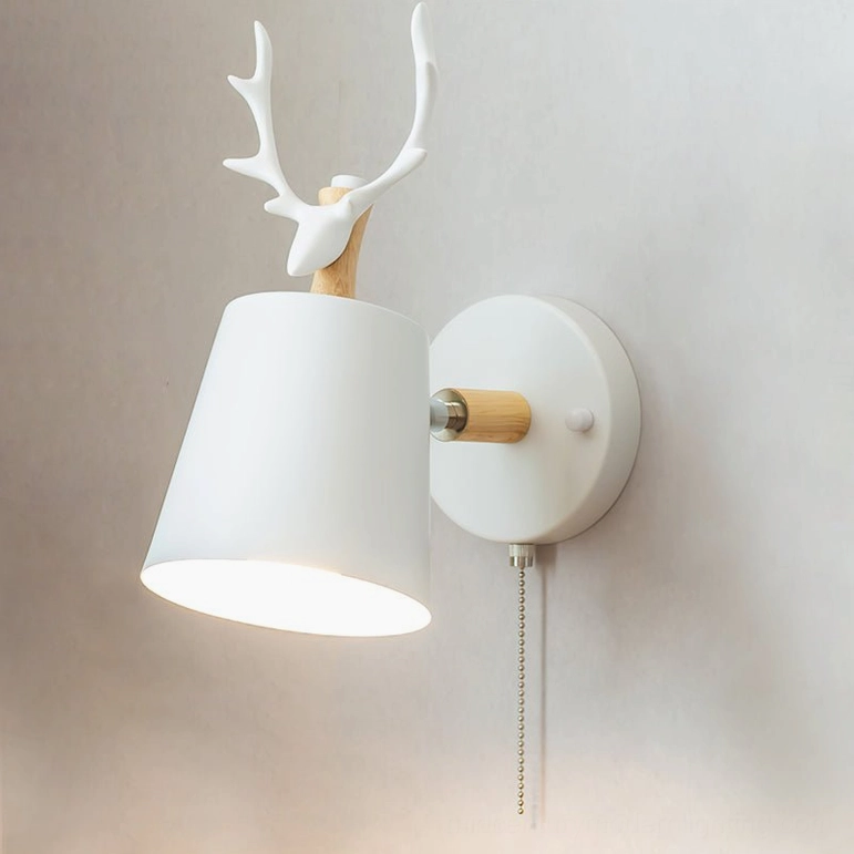 Nordic antler wall lamp in white finish with pull-chain zipper switch, close-up front view showing sculptural resin antler details