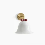 White Bow Bell Wall Lamp with brass metal mount and red bow accent, front view on white background