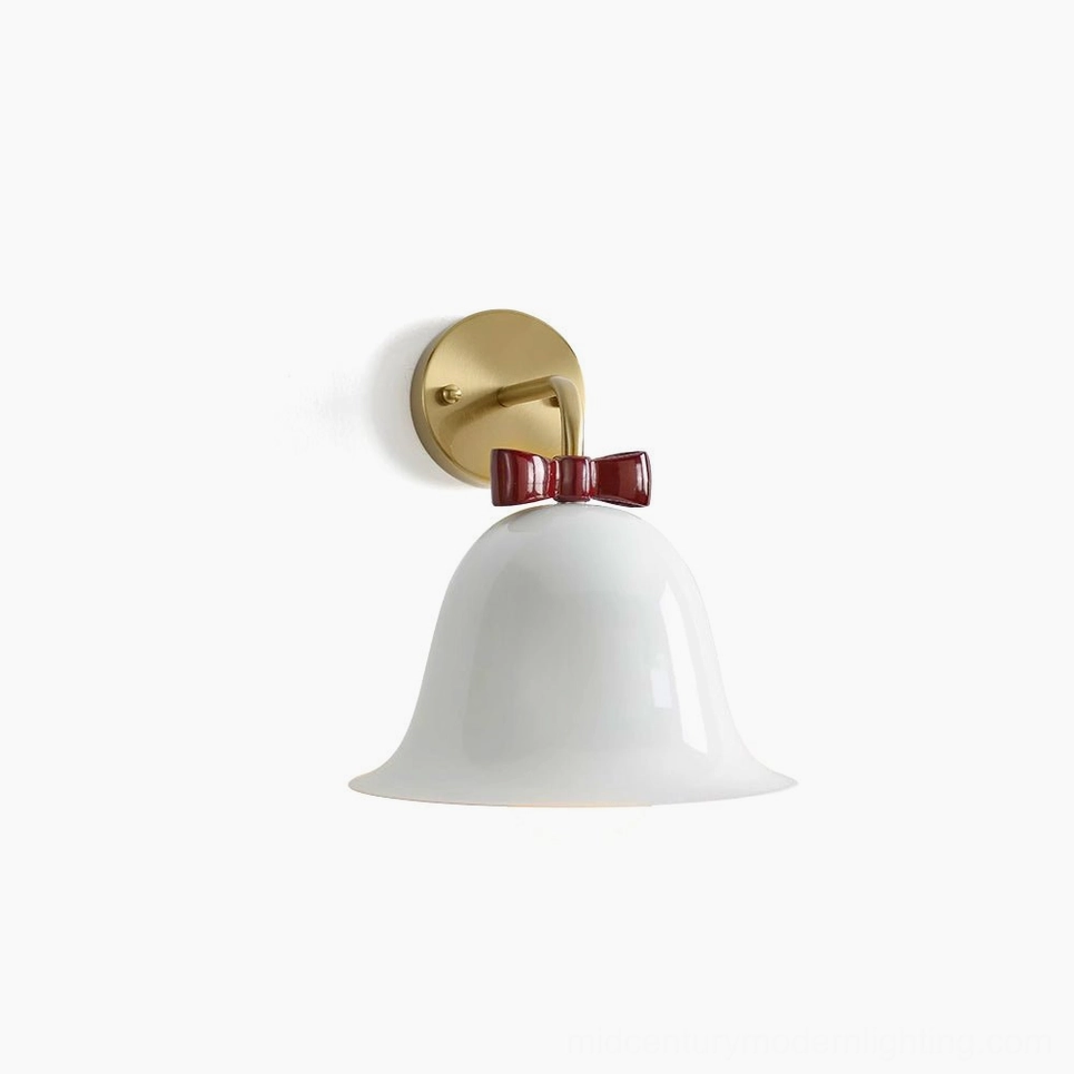 White Bow Bell Wall Lamp with brass metal mount and red bow accent, front view on white background