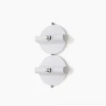 Dual modern minimalist white wall sconces with chrome hardware mounted on white wall, studio shot