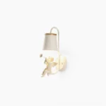 Angel wall sconce with white cupid figurine playing trumpet on neutral studio background - minimalist nordic design
