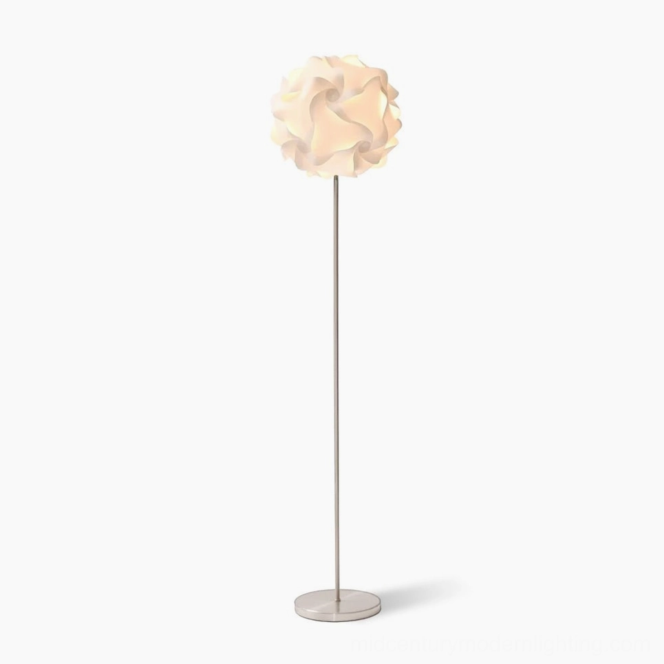 Modern flower floor lamp with white diffuser and silver metal stand on minimalist white background