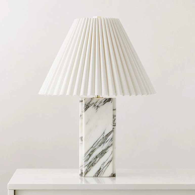 White marble Bianca table lamp with crisp pleated white shade on minimal background