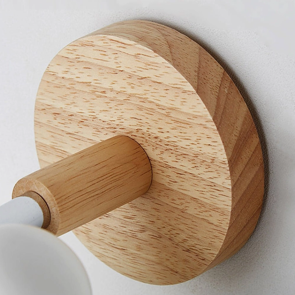 White mouse wall sconce with Edison bulb creating vintage warm glow aesthetic
