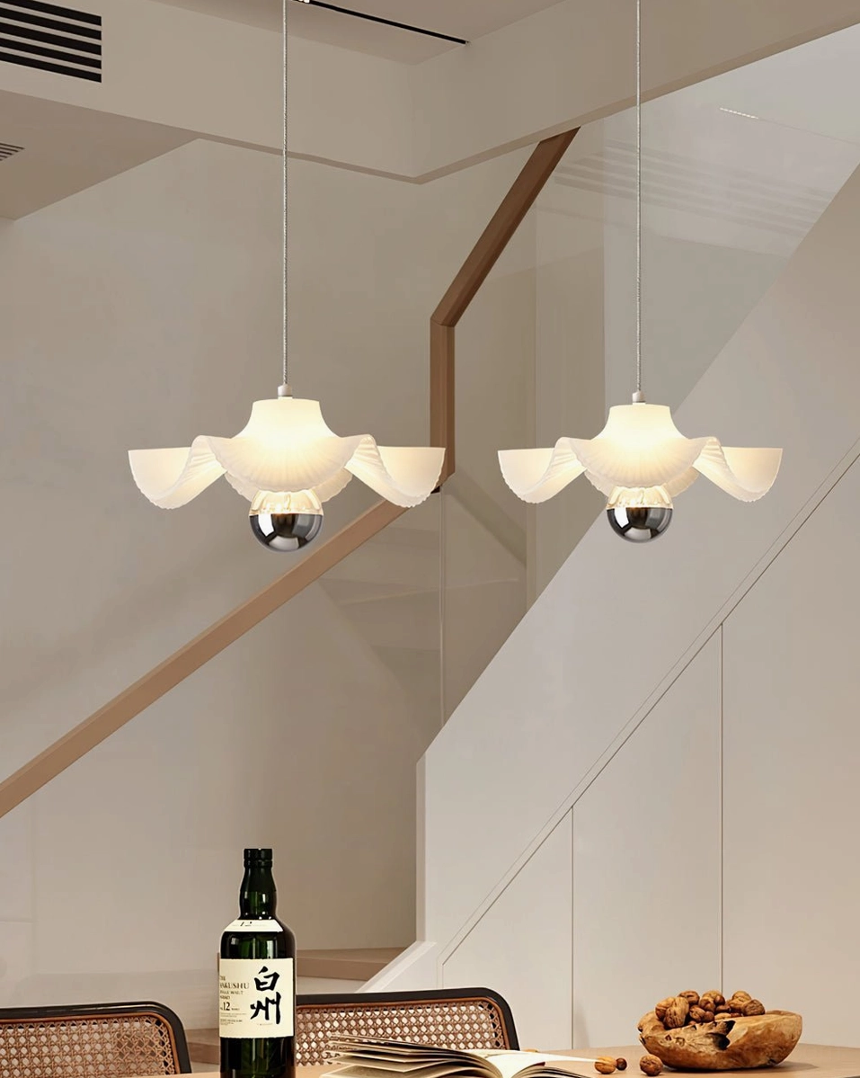 Minimalist white pleated pendant shade with chrome hardware, mid-century modern design