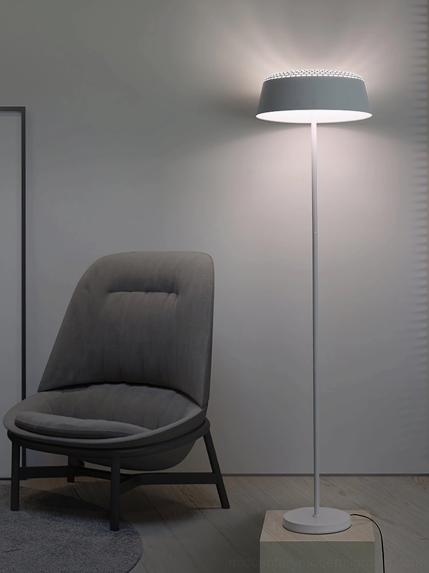 White ring floor lamp grey chair minimalist elevated home design