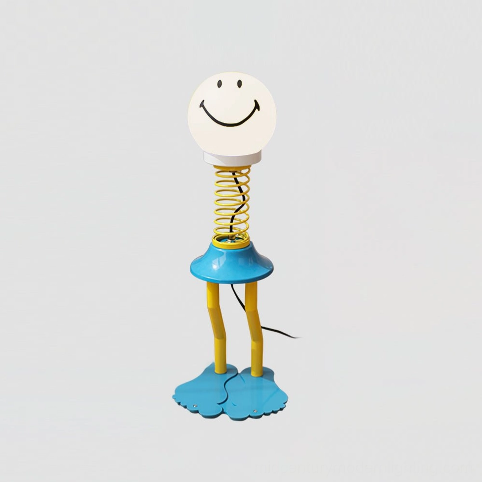White smiley face spiral spring table lamp full view showing clean modern interpretation of playful design