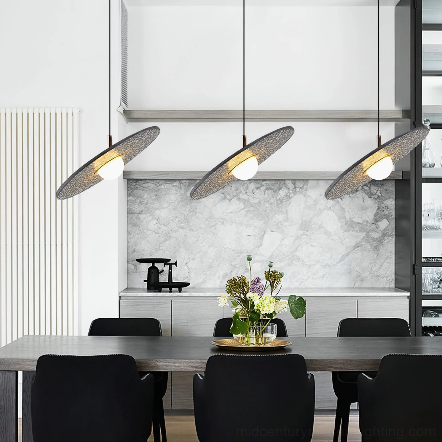 Three white terrazzo pendant lamps in minimalist Scandinavian kitchen with clean Nordic design