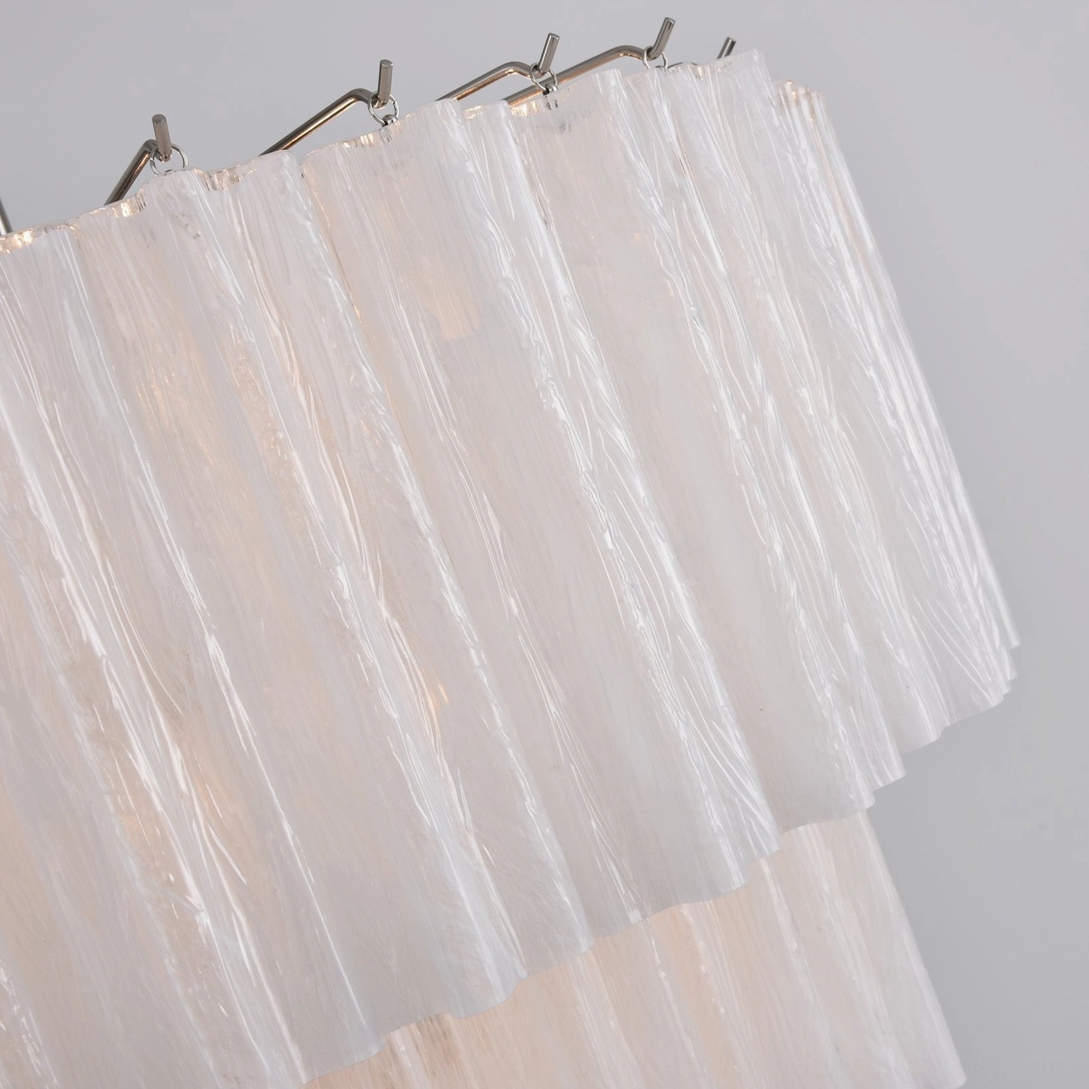 White tiered glass chandelier contemporary minimalist sculptural form ceiling pendant