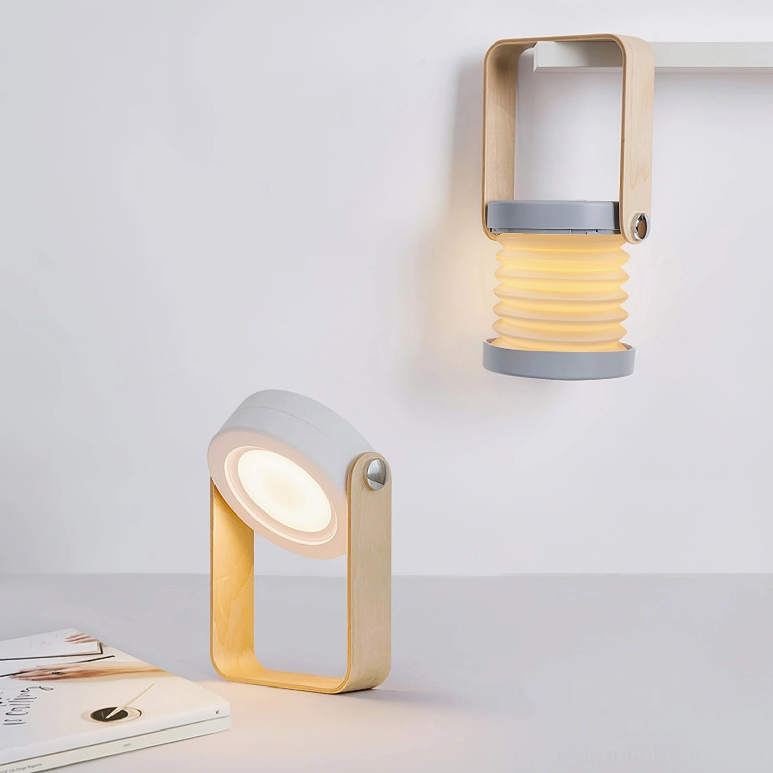 White and wood portable lantern lamp, architectural honeycomb design creating unique light diffusion pattern