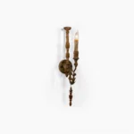 Whitey candlestick wall sconce with dual arms, brown weathered wood finish, front studio view
