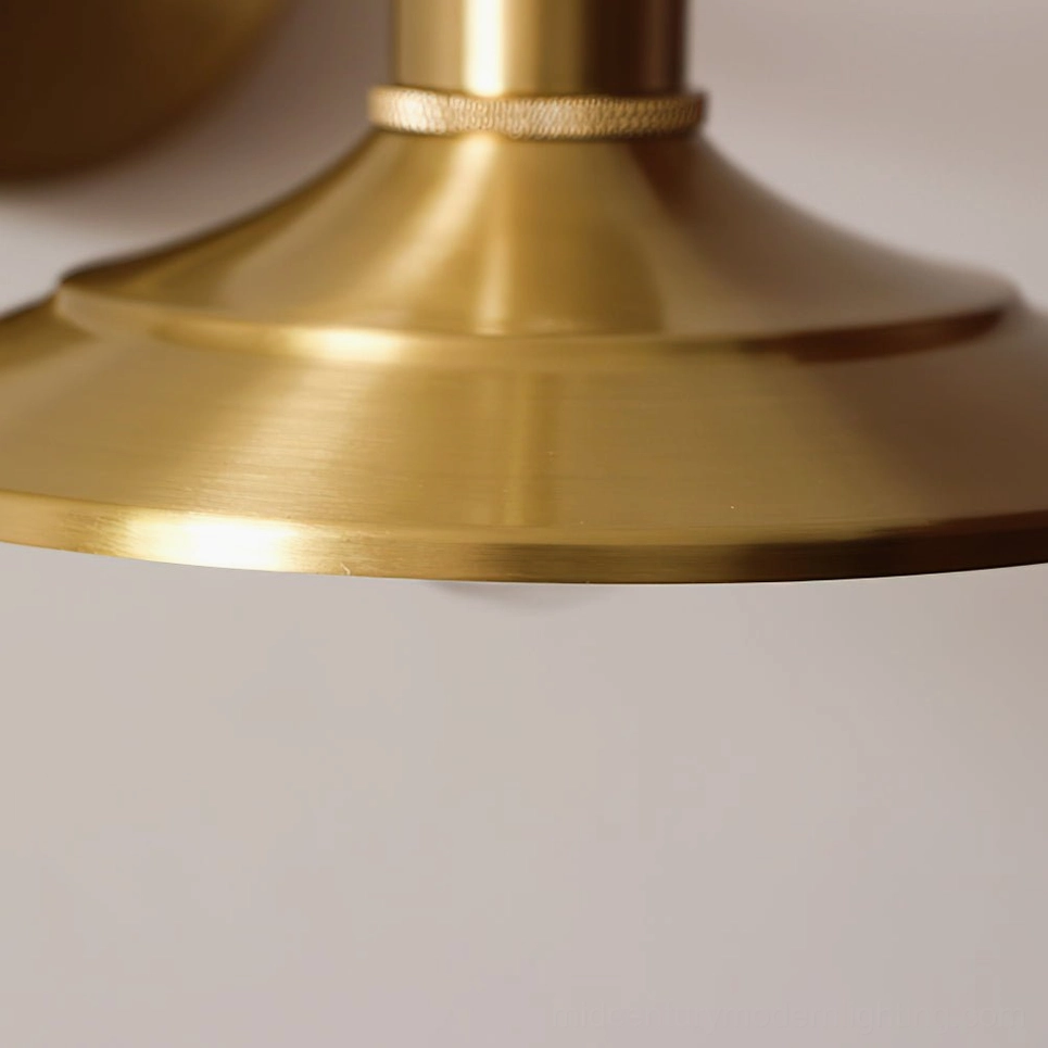 Extreme close-up of Whizzer lampshade featuring brushed brass texture, decorative braided metal ring, and artisanal craftsmanship details