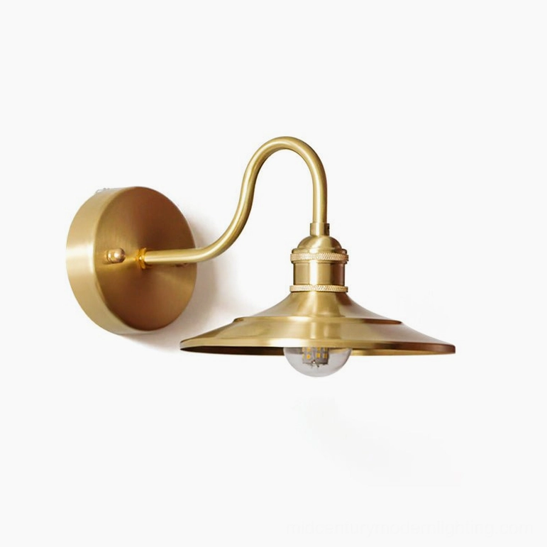 Whizzer brass wall sconce in warm polished finish showing adjustable gooseneck design and conical shade silhouette