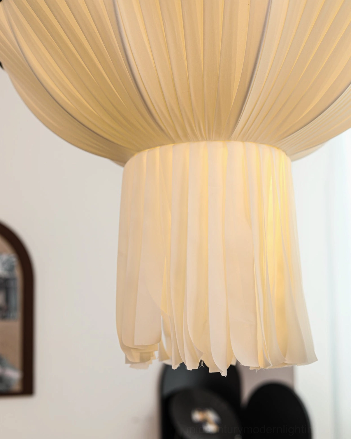 Extreme close-up of Wildon off-white pleated fabric showing draped texture and light-filtering construction