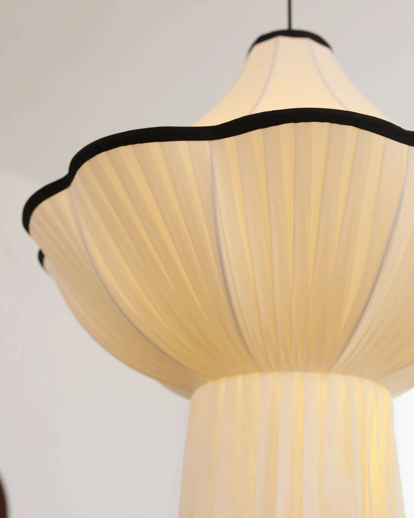 Wildon modern sculptural pendant light fabric shade detail showing sophisticated pleating and design