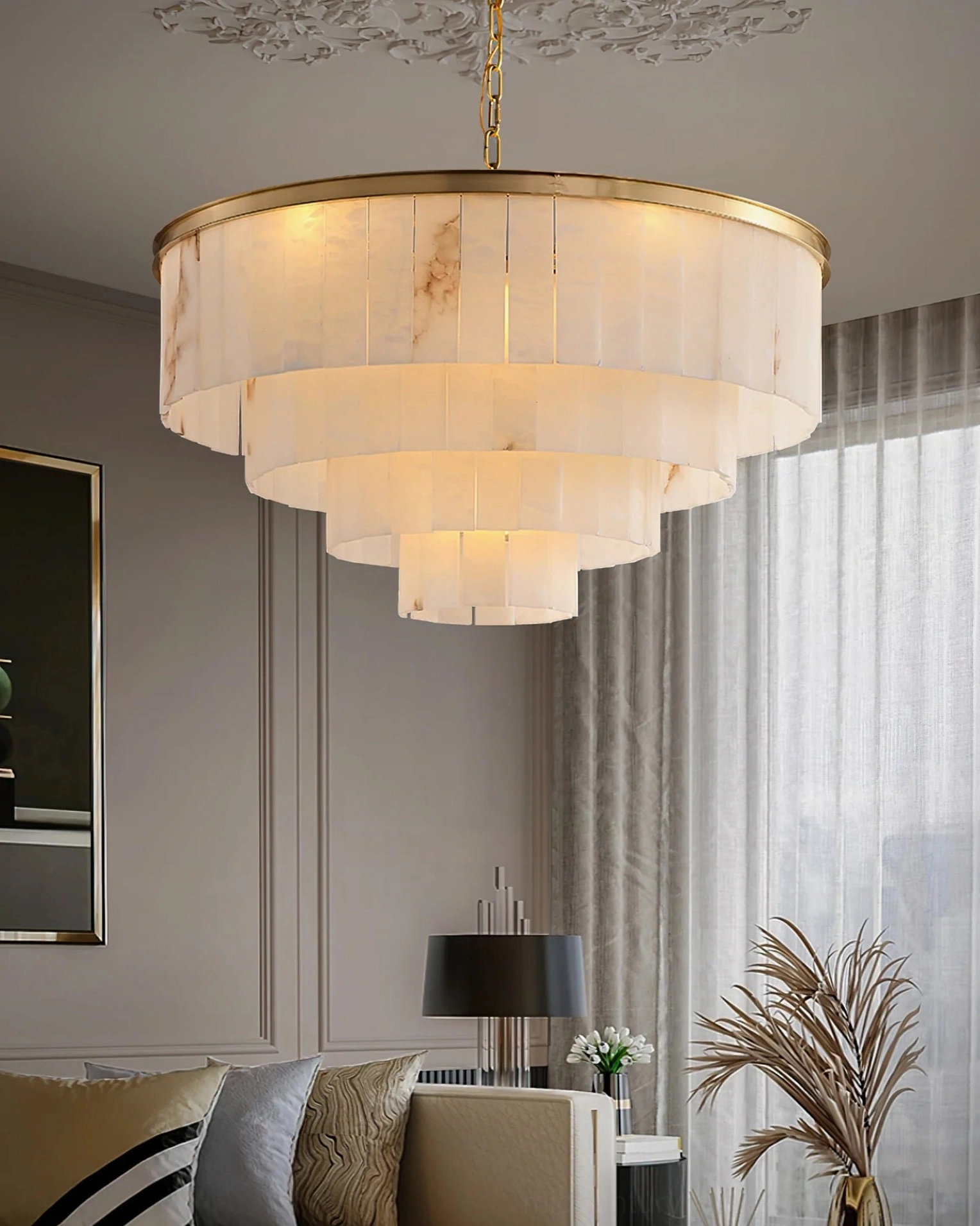 Side view of multi-tiered alabaster brass chandelier in refined living room with sheer curtains and modern decor
