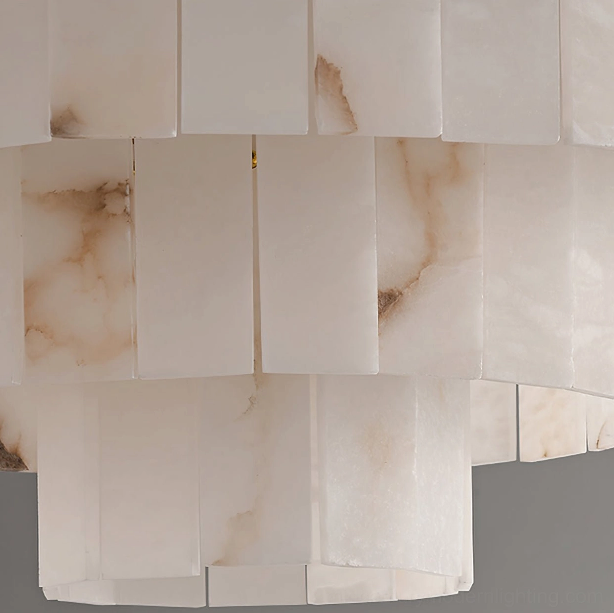 Close-up detail of rectangular alabaster shade panels showing natural brown marble veining and craftsmanship