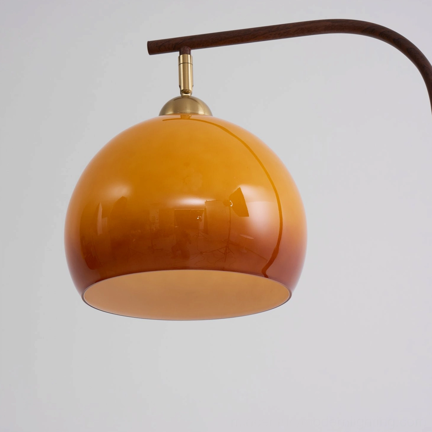 Winona arc floor lamp caramel finish variant, coordinated brass and caramel tones throughout frame