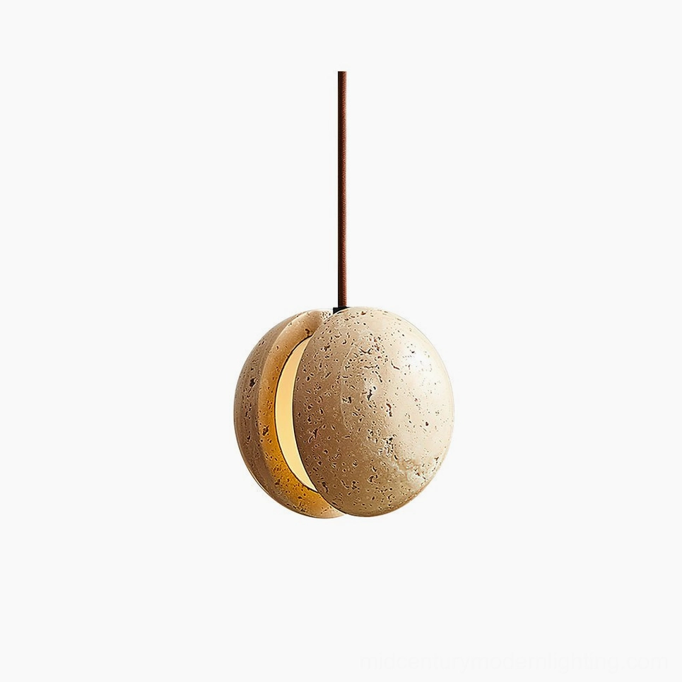 Wisteria travertine split-sphere pendant lamp close-up front view, warm LED light glowing from crescent aperture, studio background