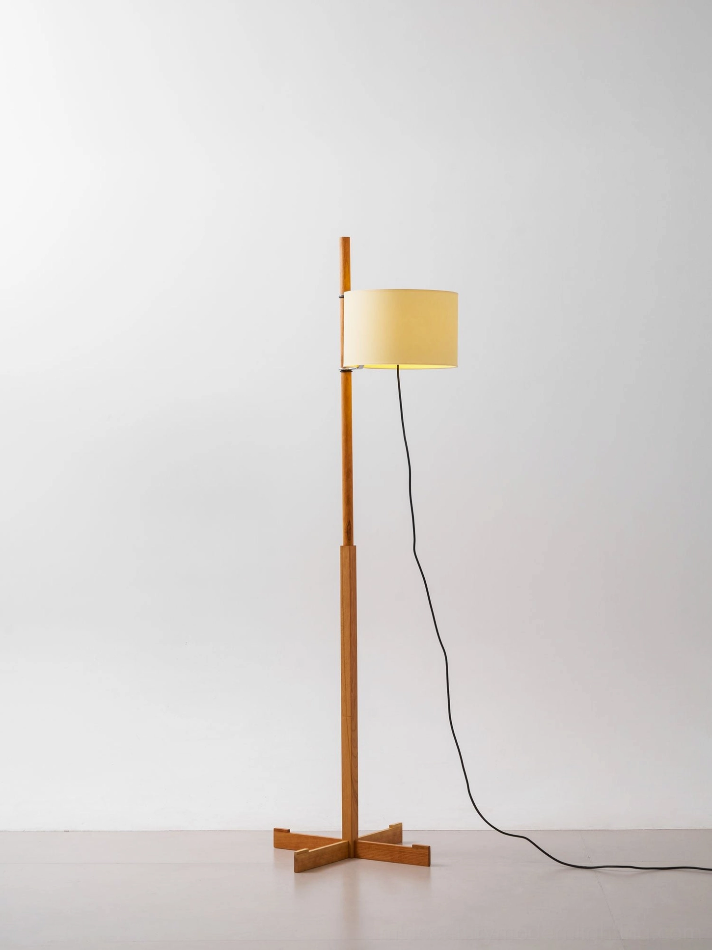 Wooden floor lamp positioned near seating in contemporary Scandinavian living room