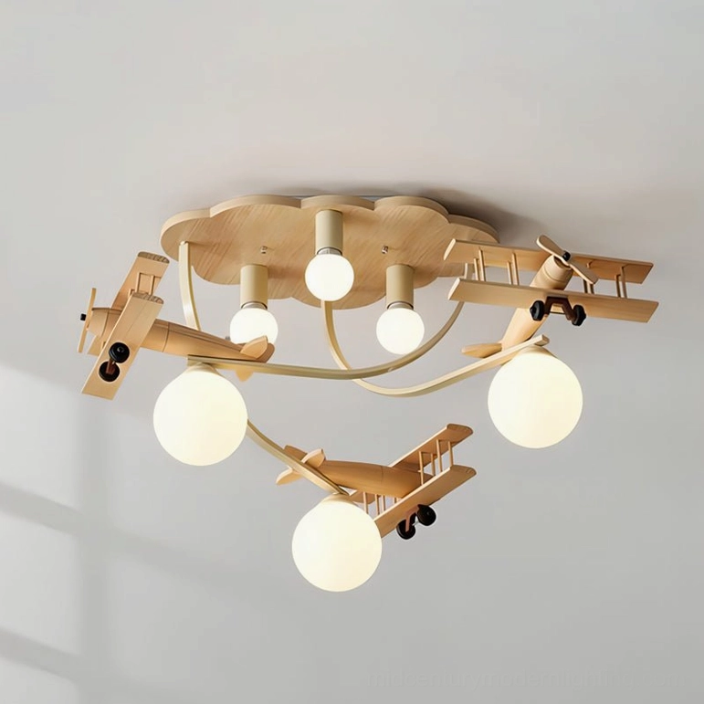 Wooden aircraft ceiling lamp with cloud-shaped wood base and propeller design, close-up overhead studio photography