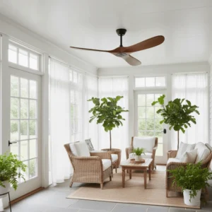 Modern wooden ceiling fan installed in bohemian sunroom with wicker seating and potted plants, natural interior styling