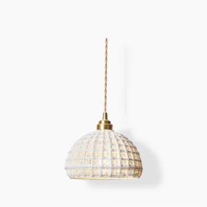 Woven ceramic pendant light with hollow lattice dome shade, white off-white color, brass ceiling hardware, front studio view